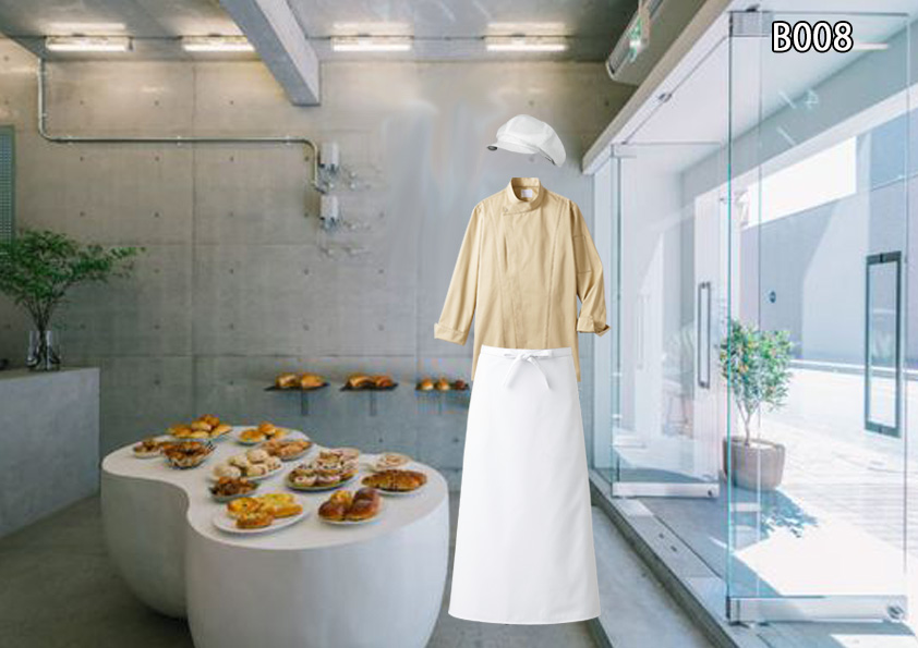 飲食店制服コーディネート　ベーカリー、パン屋さんユニフォームコーデ。モノトーンの店内をやわらかく演出する、ベージュと白の制服組み合わせ。お尻までぐるっと回る長めの巻きスカート風エプロンがとてもかわいい。